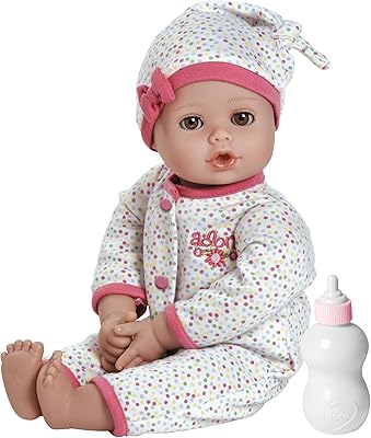 Adora 13 inch washable Baby Dot Vinyl Doll Gift box with open/closed eyes for children aged 1 year and more, includes a bottle of soft hug toy for recess.. DIAYTAR NIGERIA combines extensive variety with budget-friendly prices and prompt nationwide delivery.