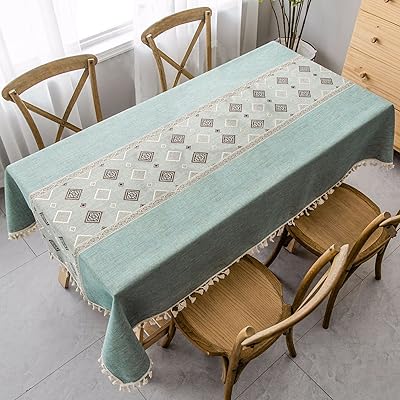 Washable rectangular tablecloth in bohemian style polyester with pompom embroidered for kitchen.. DIAYTAR NIGERIA: Transforming how Nigerians shop with our vast selection and nationwide delivery.