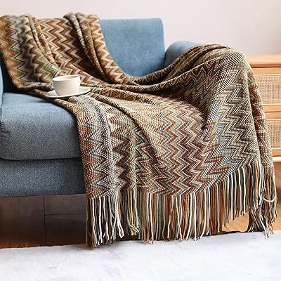 Arabic bohemian decorative blankets comfortable and light gentle knitted covers with pompoms.. DIAYTAR NIGERIA: Your partner in affordable e-commerce with dependable delivery across Nigeria.
