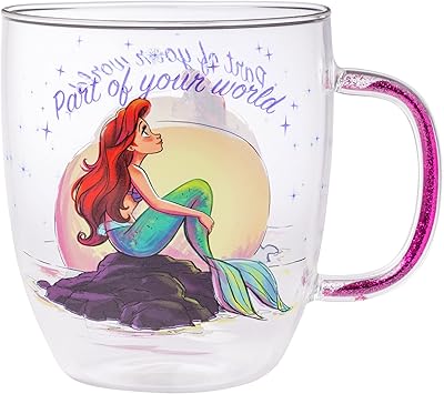 Silver Buffalo Disney Princess Ariel La Petite Sirène part of your world in glass with sparkling handle, 14 oz.. DIAYTAR NIGERIA brings affordable shopping to every Nigerian home with delivery in just 5-8 days.