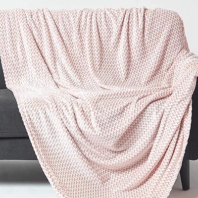Hommescapes thrown in pastel pink velvet 200 x 230 cm Soft Faux fur "Mora" woven in Chambray Jacquard for King size bed and 3 -seater sofa.. DIAYTAR NIGERIA: Where quality products become affordable with our nationwide shipping service.