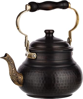 Hammered copper tea kettle half 2017, 1.6 liters (ancient brass).. Unlock endless possibilities with DIAYTAR NIGERIA's affordable marketplace and reliable delivery service.