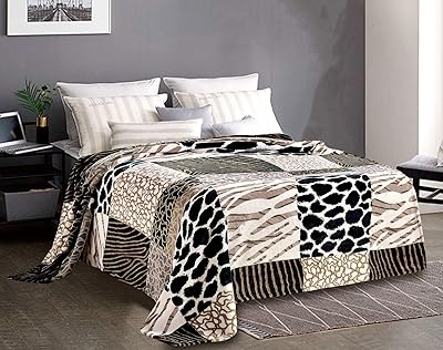 Fabien bed cover in sweet and silky flannel with animal prints for bedroom, sofa, bed, house, sofa, chair, office.. Discover the perfect shopping balance at DIAYTAR NIGERIA with competitive prices and prompt delivery.