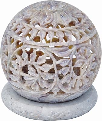 Star-shaped flan gate and hand carved ball in steatitis with decoration.. Experience shopping satisfaction with DIAYTAR NIGERIA's vast selection and budget-friendly delivery options.