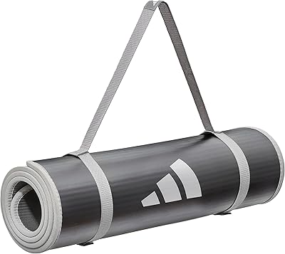 Very thick 10 mm adidas drive mat with transport strap and base.. DIAYTAR NIGERIA: Connecting Nigerians with their needs through affordable prices and 5-8 day shipping.