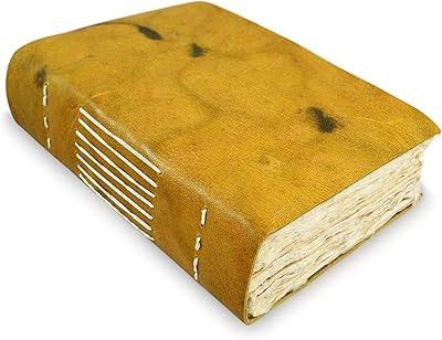 Nepal Yeti Tracker leather newspaper, writing book with Lokta paper done by hand. Made in the Himalayas of Nepal. (12.7 x 20.32 cm)... Shop quality and variety at unbeatable prices on DIAYTAR Nigeria — delivery in under 8 days.