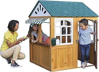 Kidkraft 405 wooden outdoor house with a view of the garden, includes fun coffee and children's accessories.. Enjoy the simplicity of shopping with DIAYTAR NIGERIA, offering vast choices delivered in just 5-8 days.