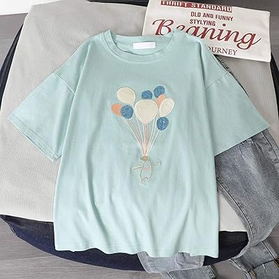 New Korean white summer t-shirt for women with sequins decorated with a large design with half-manches.. DIAYTAR NIGERIA: Revolutionizing accessibility to quality products at budget-friendly prices across Nigeria.