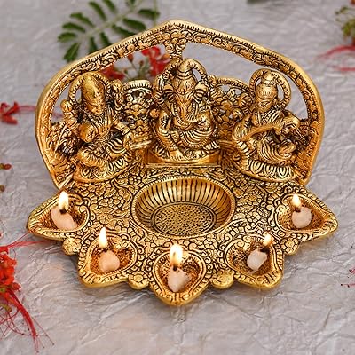 India collector oil lamp laxmi ganesh saraswati idol diya deepak - metal figurine lakshmi ganesha - traditional diya for diwali puja - Diwali decoration gifts for the house.. Discover the joy of online shopping with DIAYTAR NIGERIA's budget-friendly prices and reliable shipping.