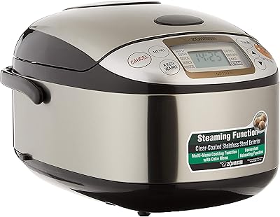NS-TSQ10 rice cooker in brown steel zogrush 220-230 volts.. Affordable online shopping is just a click away with DIAYTAR Nigeria.
