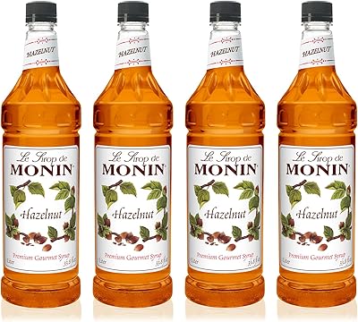 Monin - hazelnut syrup, caramelized hazelnut taste, natural aromas, ideal for mochas, latted, smoothies, shakes and cocktails, GMU without gluten (1 liter, package of 4).. Everything you need is just a click away with DIAYTAR Nigeria — shop now and receive your order in days.