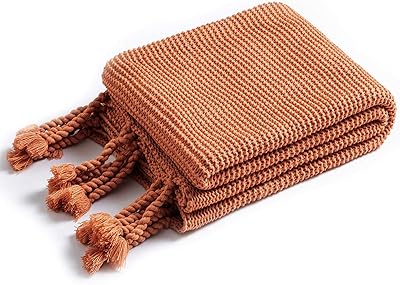 Knitted blanket with Rudong M Rast orange pampilles for sofa and bed, size 50 "x 60".. DIAYTAR NIGERIA brings the market to your fingertips with affordable prices and swift delivery services.