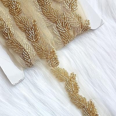 Golden embroidered lace edges for crafts and 2 cm clothes (1 meter) wide.. Find quality and variety without breaking the bank — only on DIAYTAR Nigeria.