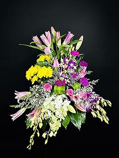 Mixture of fresh flowers memories of jennyflowers flower arrangements.. Your shopping journey simplified with DIAYTAR NIGERIA's vast selection and budget-friendly shipping.