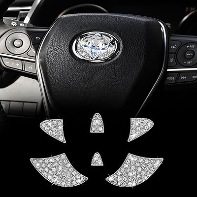 TOYOTA COROLLA RAV4 TOYOTA COROLLA RAV4 TOYOTA CRISTAL CASTER EMBLA, interior design in shiny diamond decorated with a brilliant logo for the edges of the car of the car of the car of the car of the car.. DIAYTAR NIGERIA connects you with endless possibilities through our affordable e-commerce platform.