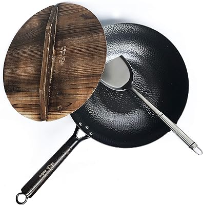 Frying stove in carbon steel for electric, induction and gas stoves (includes a lid, a spatula and a video seasoning guide).. Experience retail therapy without the financial stress at DIAYTAR NIGERIA's affordable e-commerce platform.