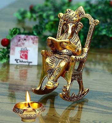 SHARYA CRAFTS Statue of Lord Ganesha reading Ramayana sitting on a chair with idol.. Shop smarter with DIAYTAR Nigeria — affordable prices and a wide product range delivered in just 5 to 8 days.