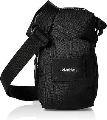 Calvin Klein M Set Reporter Crossover for Men, CK Black, One Size, Bags.. Transform your online shopping experience with DIAYTAR NIGERIA's affordable and diverse marketplace.
