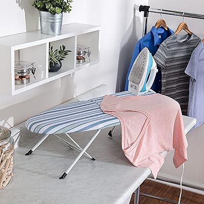Honey-can-do foldable ironing board with iron support BRD-09222, blue, 32 "length x 12" wide.. Shopping made simple with DIAYTAR NIGERIA's vast selection and budget-friendly nationwide delivery.