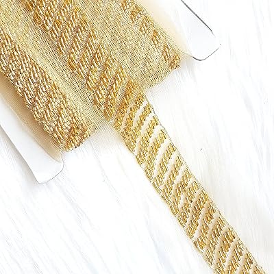 Golden embroidered lace edges for crafts and clothes 3 "wide (1 meter).. Your ideal shopping companion, DIAYTAR NIGERIA offers unmatched variety with delivery within a week.