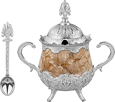 The Moda Home Sucrier Silver with spoon and lid for home, kitchen, weddings and chocolate service, elegant design for sugar pieces and powdered sugar - Brown.. Your trusted marketplace, DIAYTAR NIGERIA offers extensive variety with delivery within 8 days.