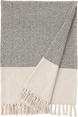 Bloomingville A14208833 thrown in mild cotton gray and cream with fringes.. DIAYTAR NIGERIA combines affordability with convenience, delivering your purchases within 5-8 days.